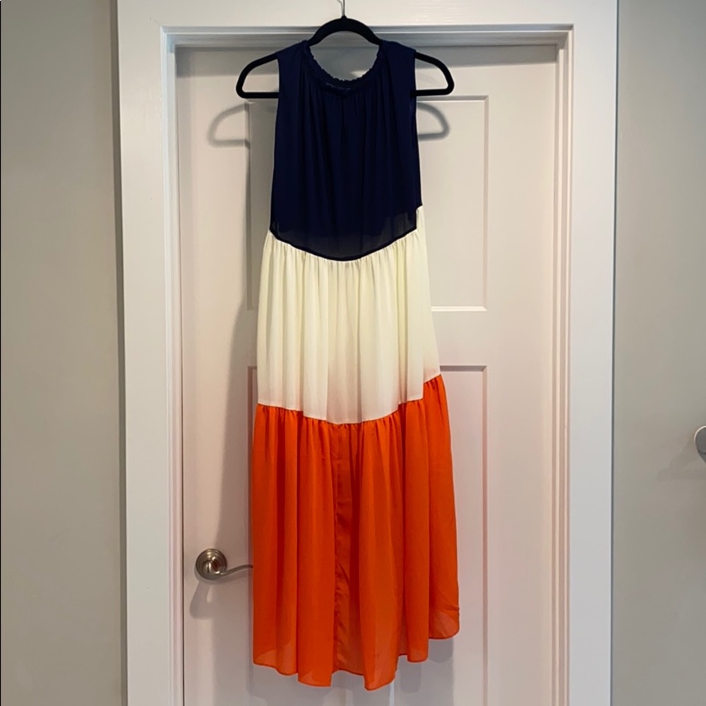 Blue, cream, orange tiered dress.